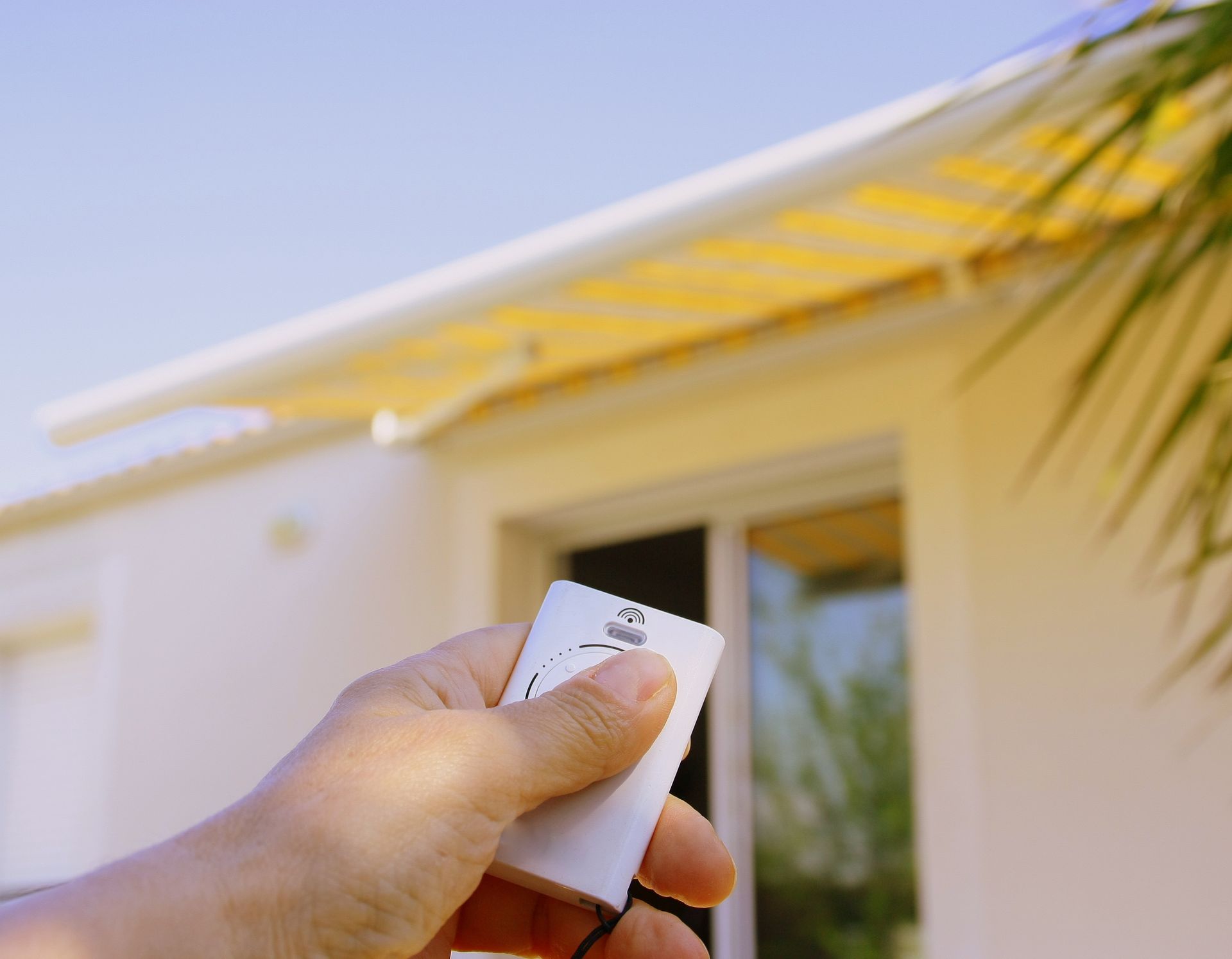 motorized awning being controlled by a remote