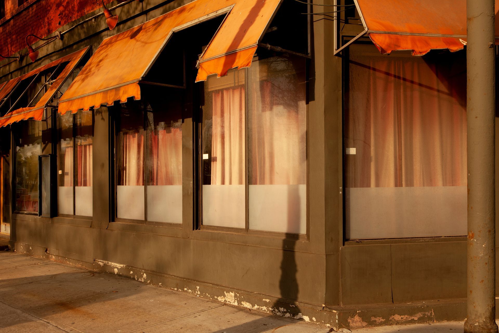 old commercial awnings that need to be replaced