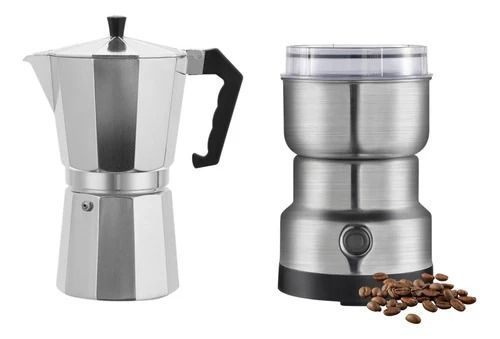 Cafetera moka y molinillo de café eléctrico, ambos de acero inoxidable, con los granos de café a un lado.
