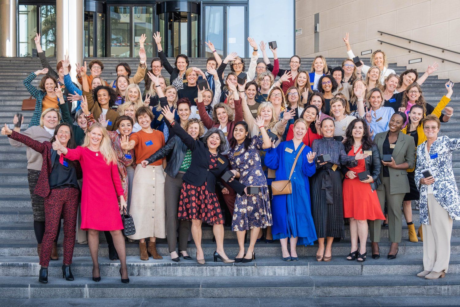 Group photo oh the InspiringFifty waving - CEO Miet Loix Group photo oh the InspiringFifty waving - CEO Miet Loix