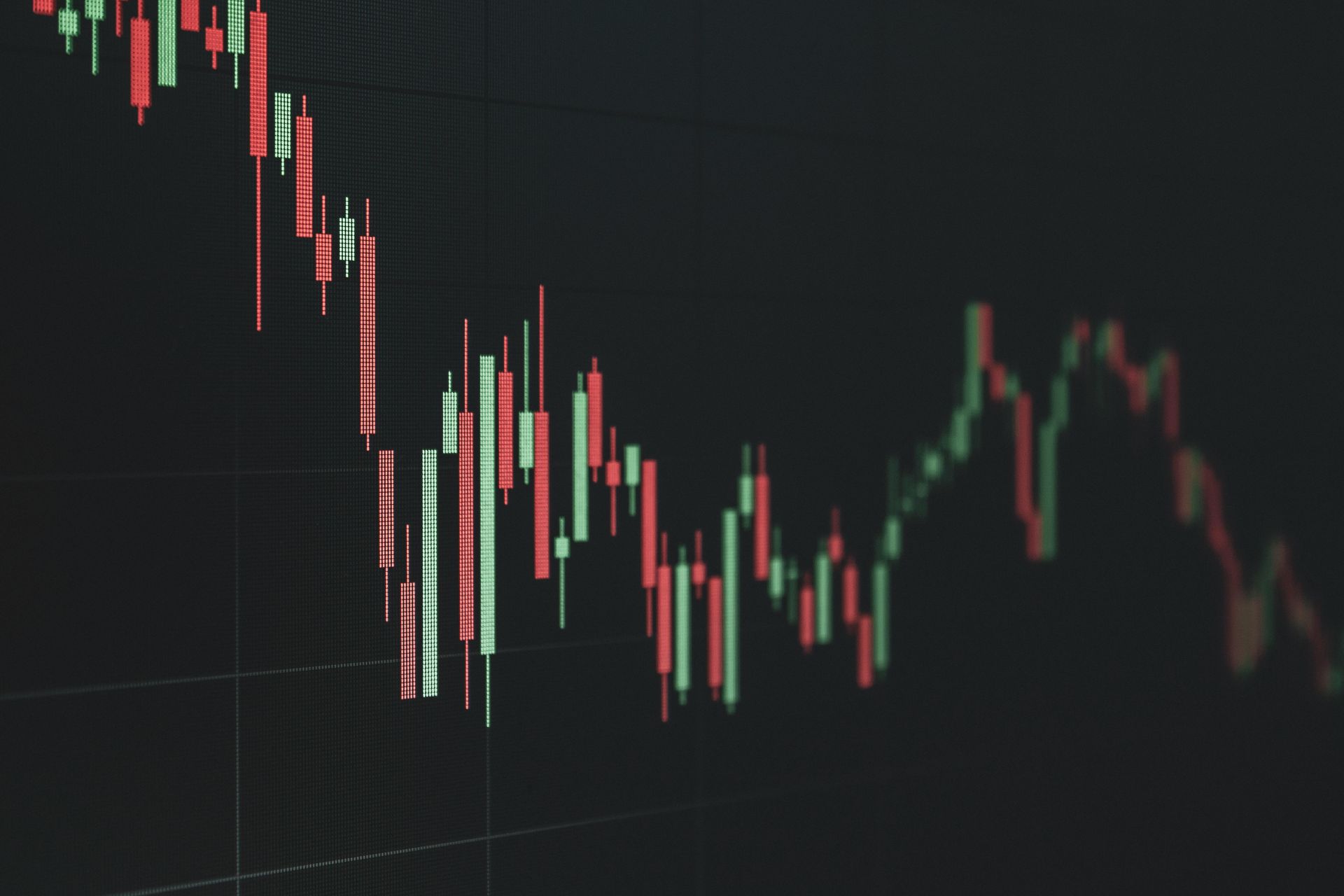 Dark candlestick stock chart showing a sharp decline and fluctuating prices Dark candlestick stock chart showing a sharp decline and fluctuating prices
