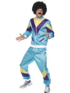 Person in a Blue 1980s Tracksuit and Afro Wig, Striking a Pose — Costumes Galore in Maroochydore, QLD