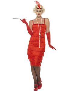Woman in Red Flapper Dress, Holding Cigarette Holder, and a Headband — Costumes Galore in Maroochydore, QLD