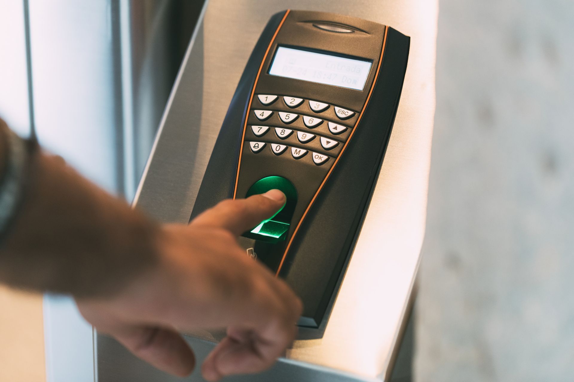 Worker scanning finger print.