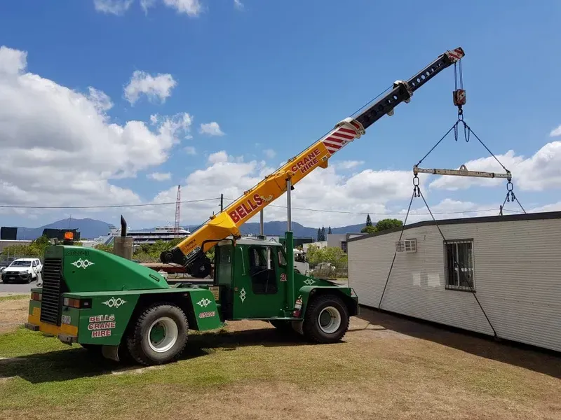 Green and Yellow Crane — Bell's Carrying & Crane Hire Service Pty Ltd in Bungalow, QLD