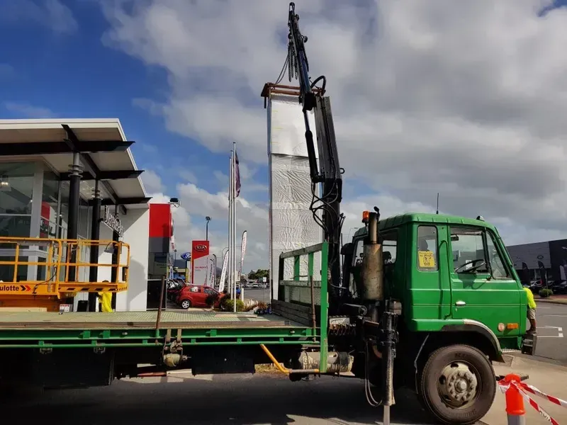 Green Truck — Bell's Carrying & Crane Hire Service Pty Ltd in Bungalow, QLD