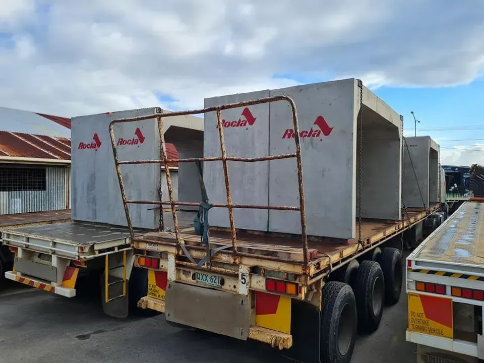 Concrete Culvert Sections Loaded — Bell's Carrying & Crane Hire Service Pty Ltd in Innisfail, QLD