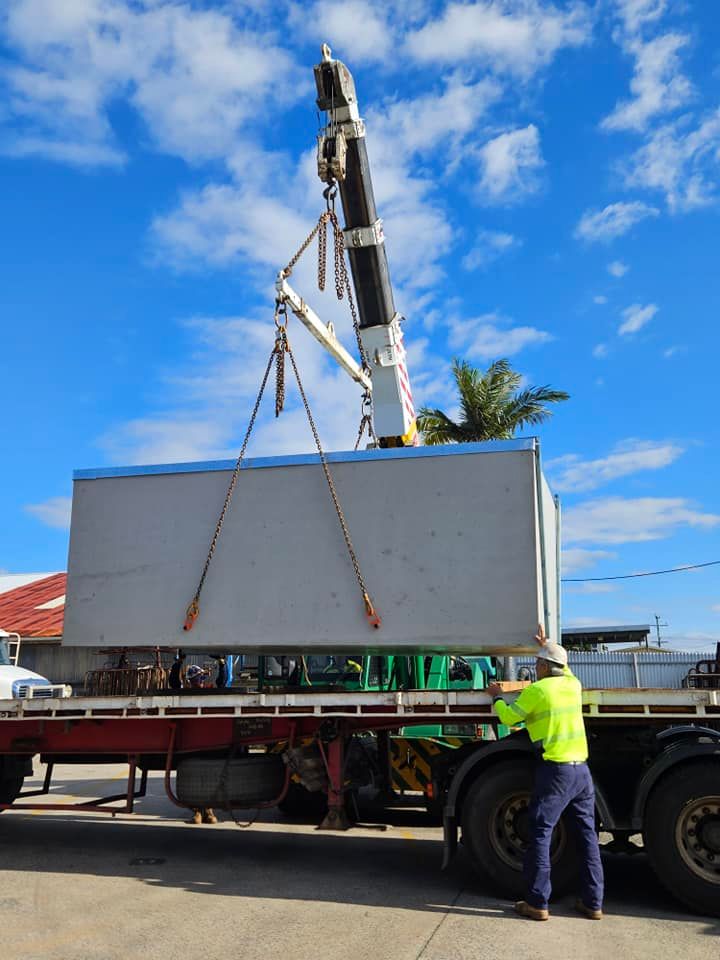Crane Lifting a Large — Bell's Carrying & Crane Hire Service Pty Ltd in Port Douglas, QLD