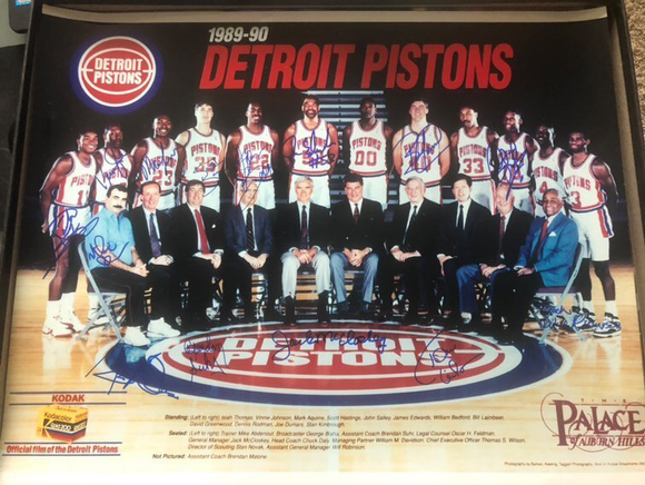1989-90 Detroit Pistons team photo with signatures, standing and seated, at the Palace of Auburn Hills.