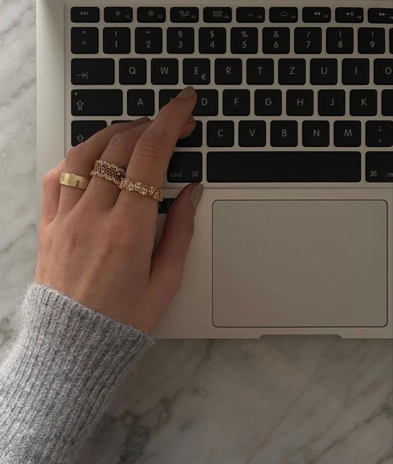 woman typing on keyboard at a digital marketing agency
