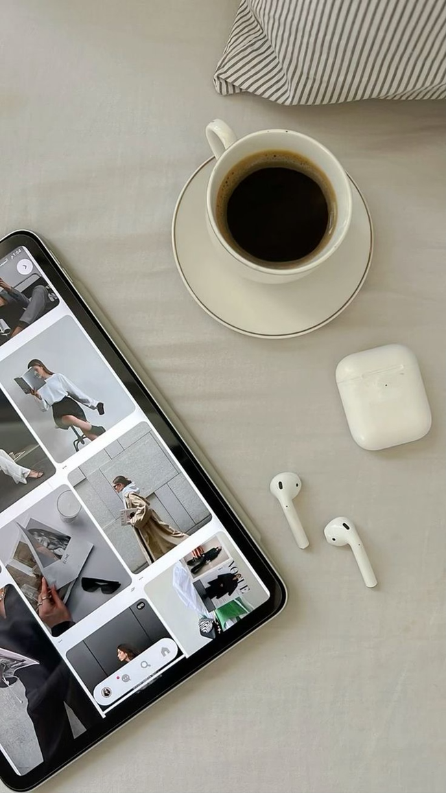 ipad with headphones and coffee