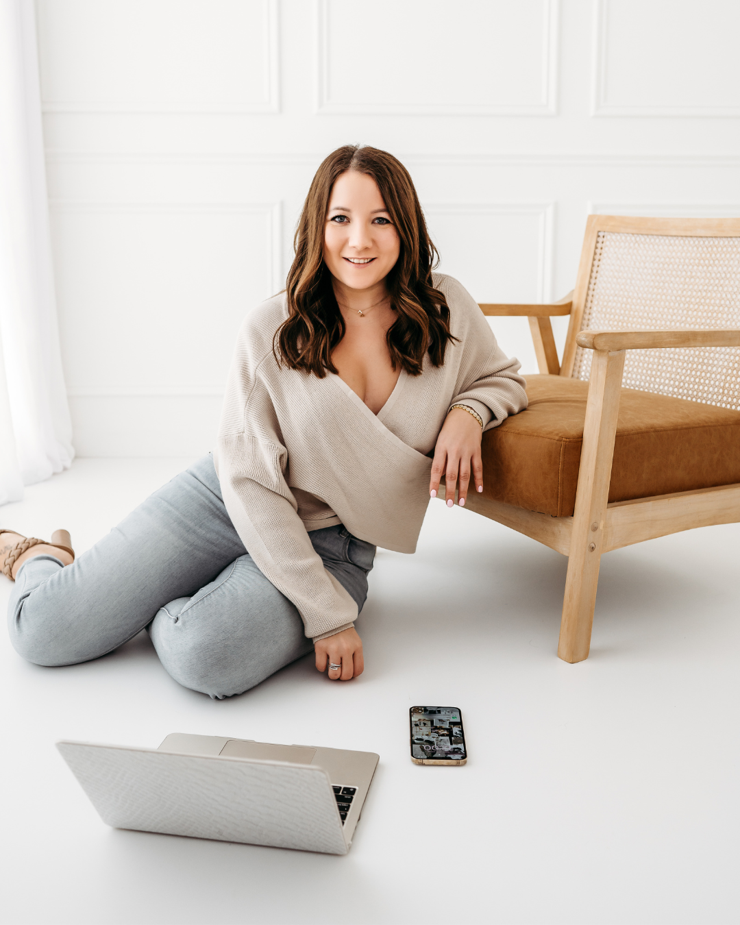 digital advertising expert behind computer and phone