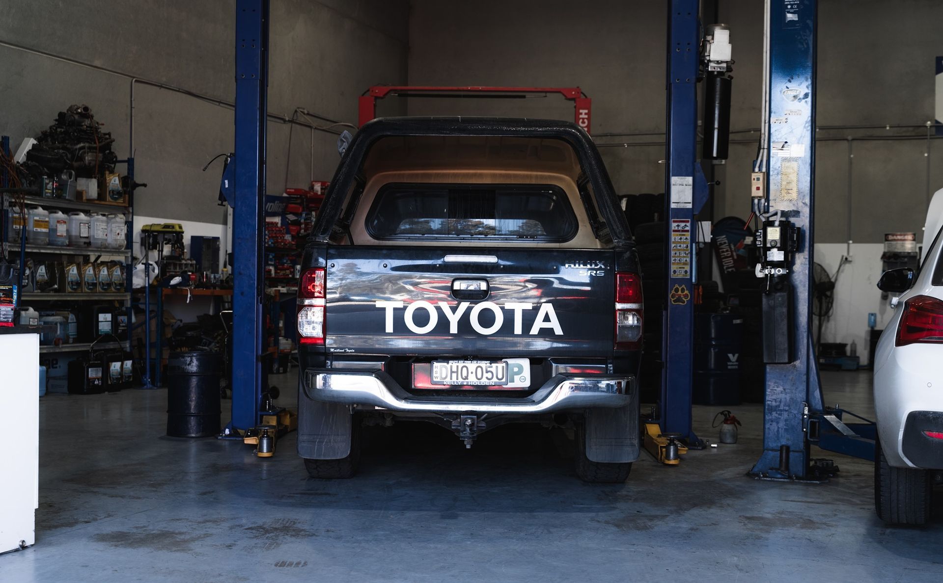 Black Toyota Pickup in An Auto Repair Garage — Gardiner Automotive & Performance in Rutherford, NSW