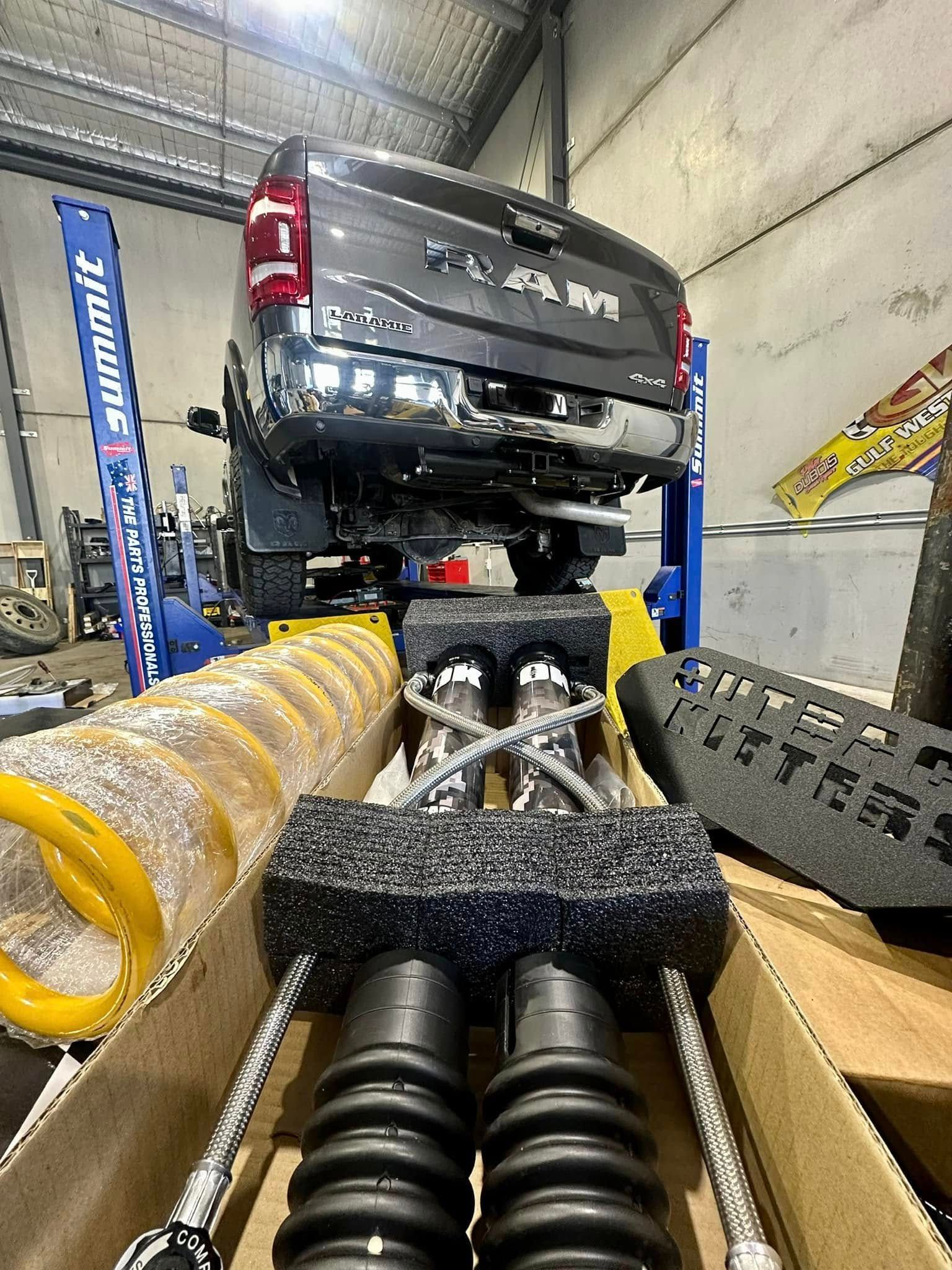 Car Parts and Suspension Coils in A Workshop — Gardiner Automotive & Performance in Rutherford, NSW