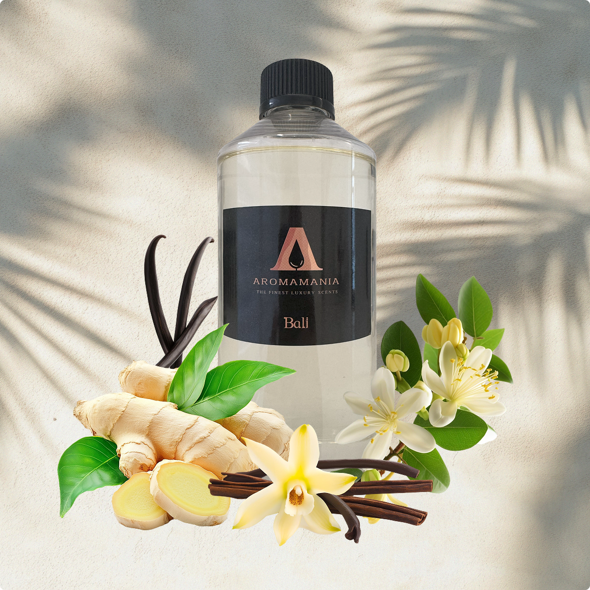 A bottle of ginger and vanilla surrounded by flowers and leaves