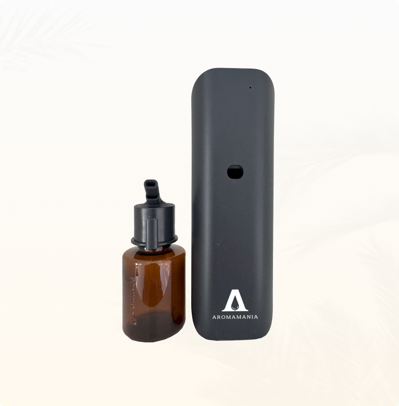 A white device and a brown bottle on a white background.