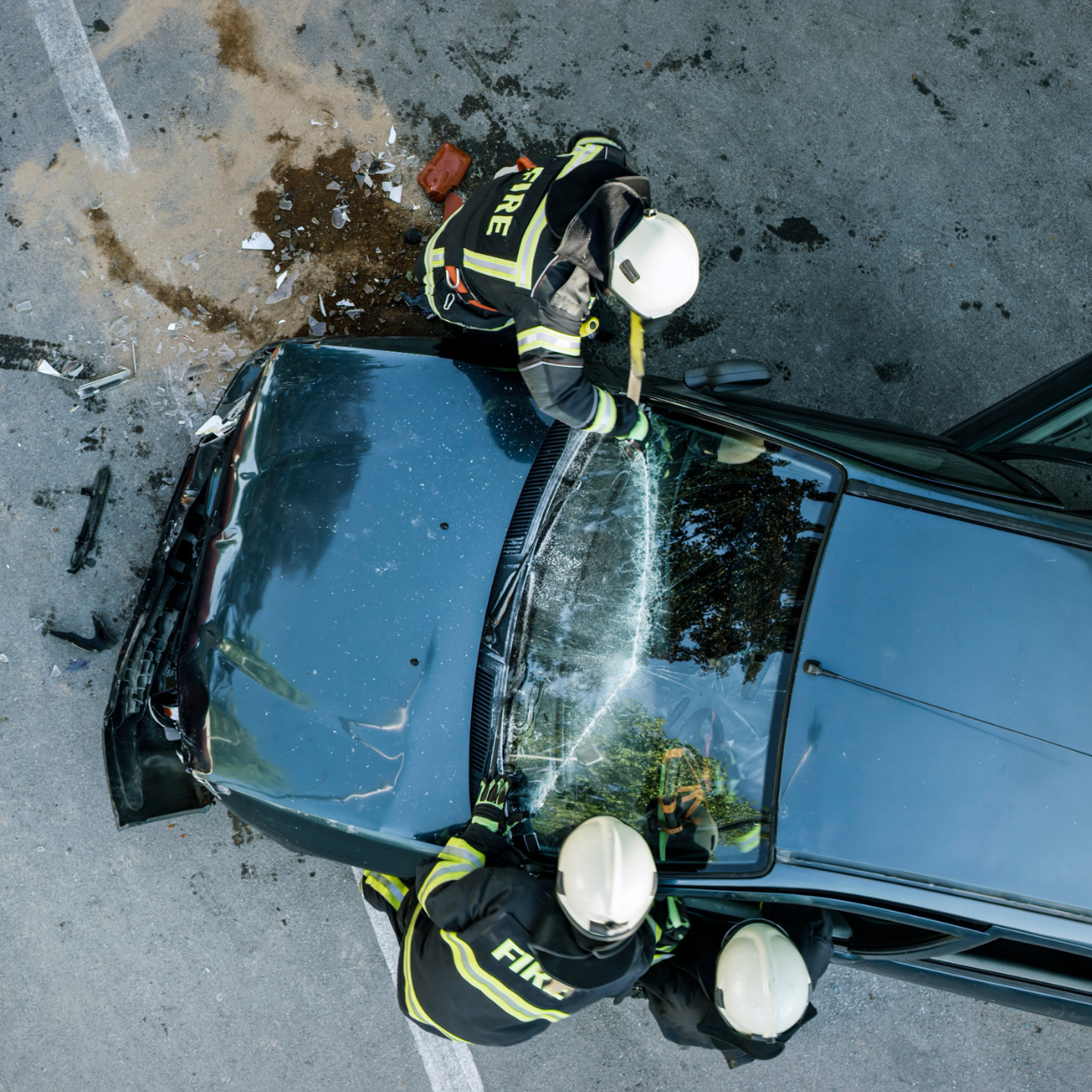 two firefighters are working on a car crash Valparaiso, IN