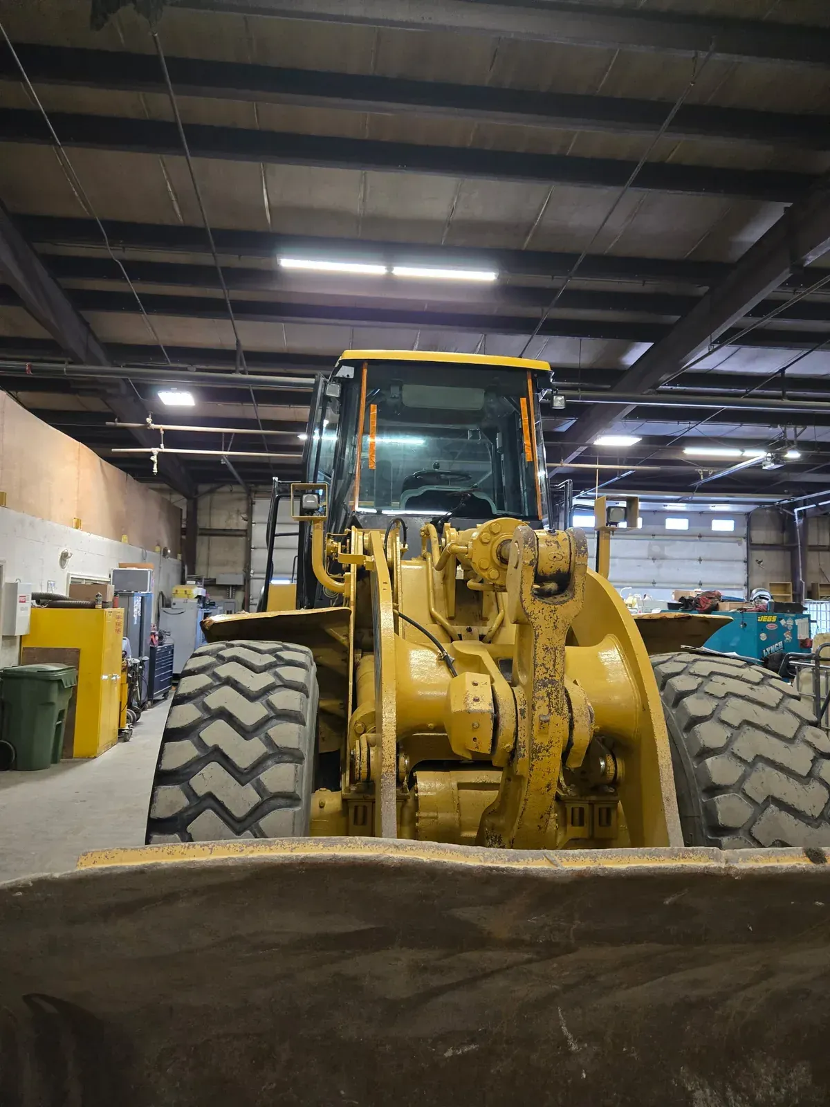 Replacement windshield installed on heavy equipment