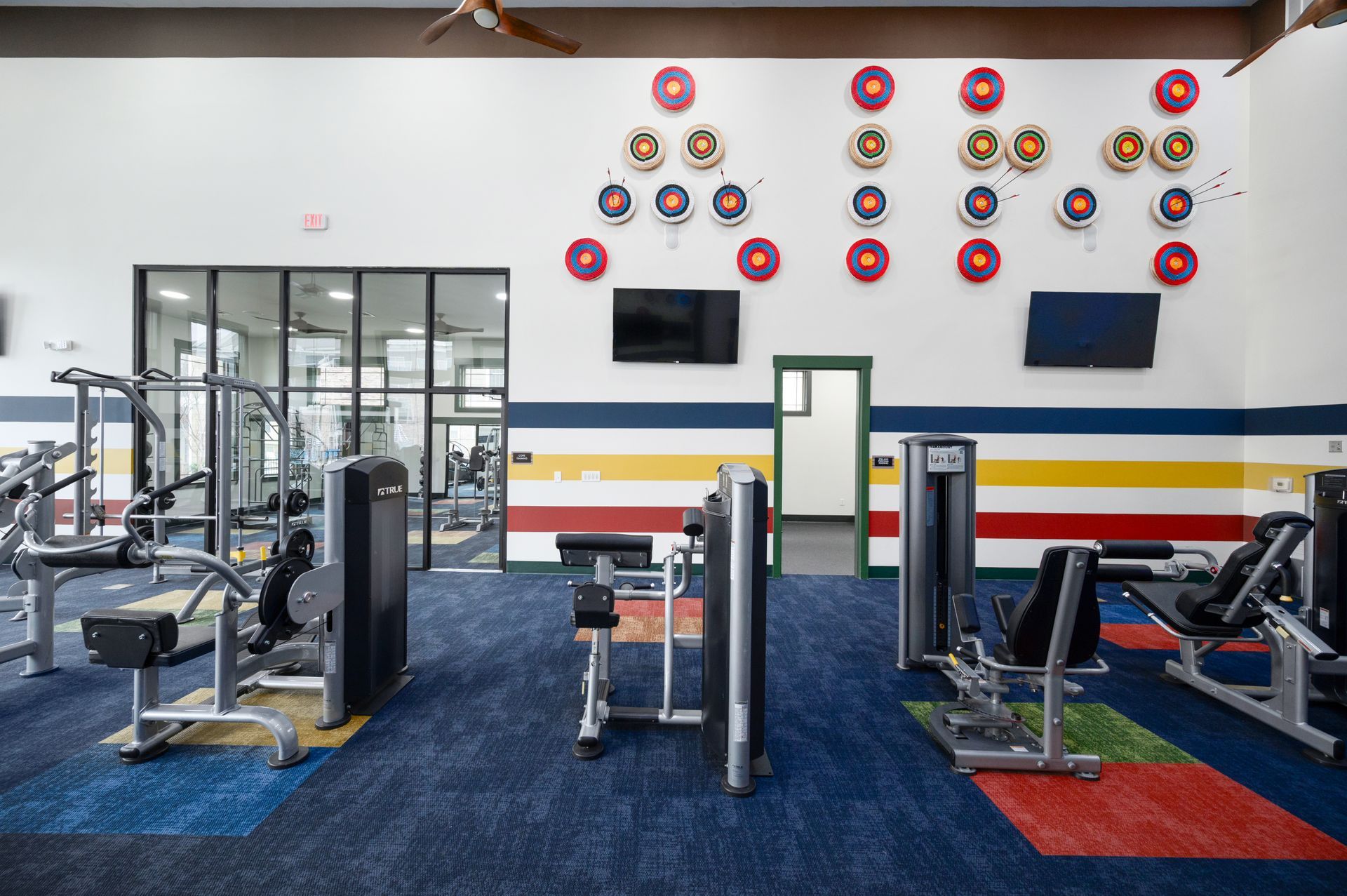 Silver Collection at Cosner's Corner fitness center with weight machines, workout mats, and training equipment in Fredericksburg, VA.
