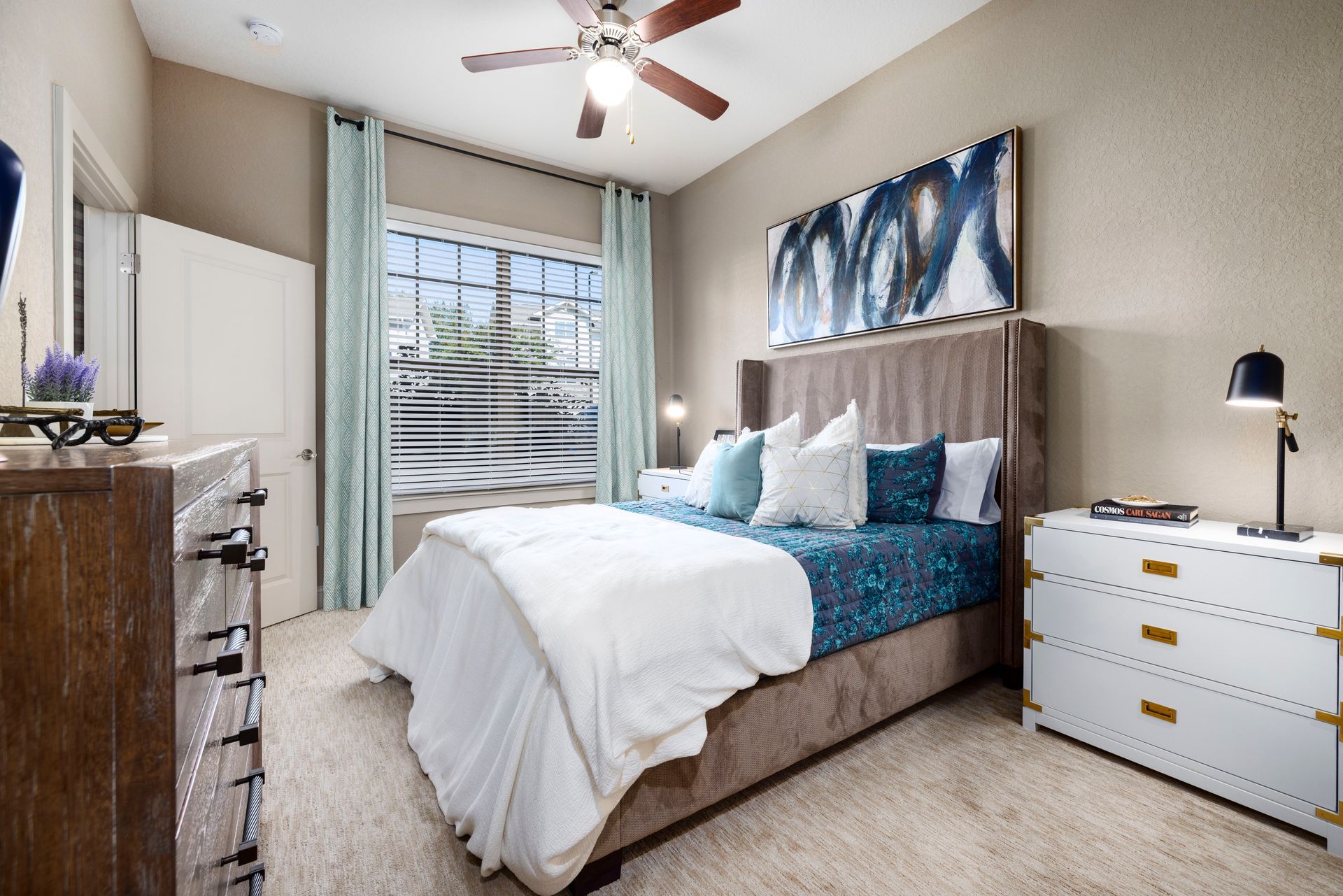 Silver Collection at The Park apartment bedroom with white dresser and window views in Huntersville, NC