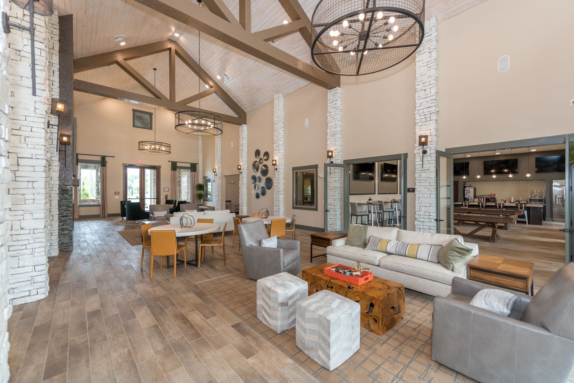 A large living room with a couch and chairs