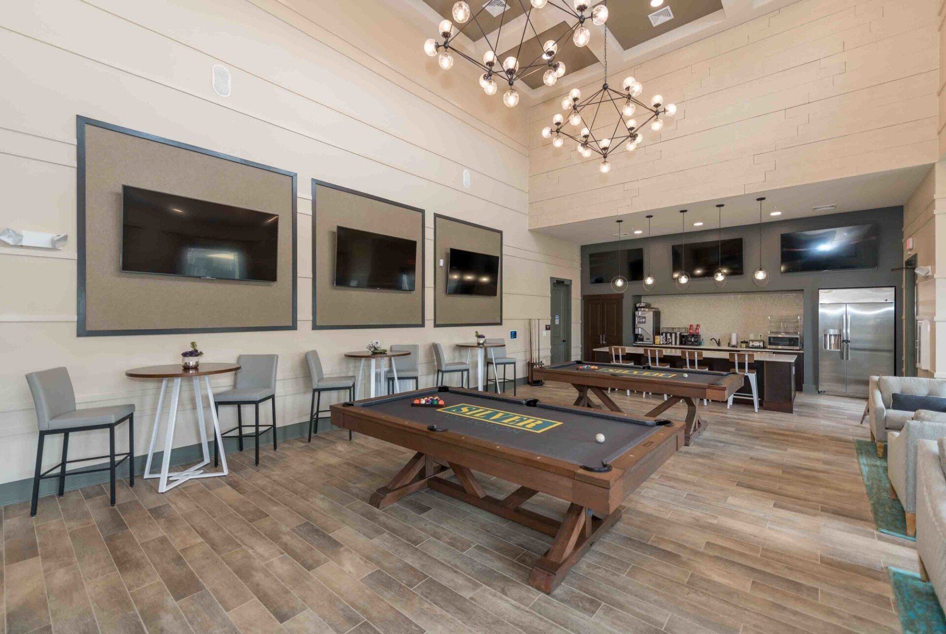 Silver Collection at Celebrate game room with pool table and resident gathering space in Fredericksburg, VA