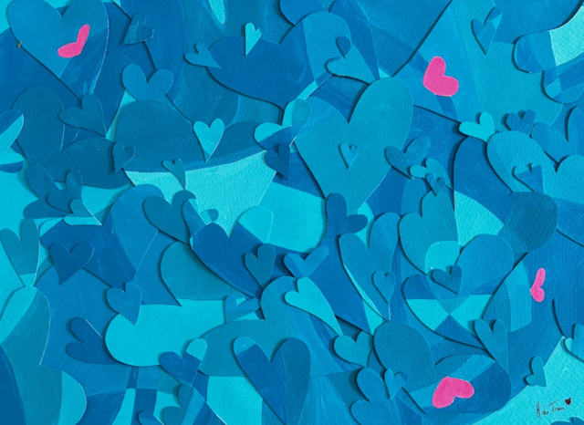 Blue paper hearts with a few pink hearts scattered across a textured background