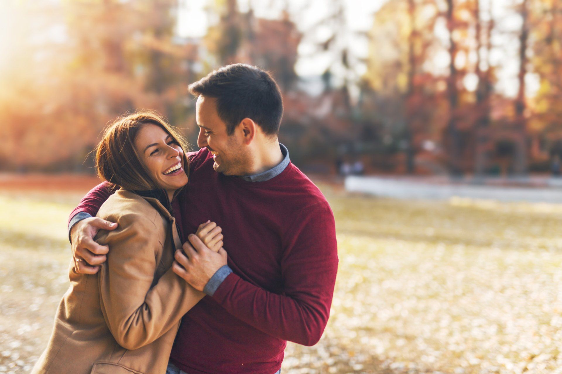 Happy Couple Hugging — Lumberton, NC — Graham Law Firm Happy Couple Hugging — Lumberton, NC — Graham Law Firm