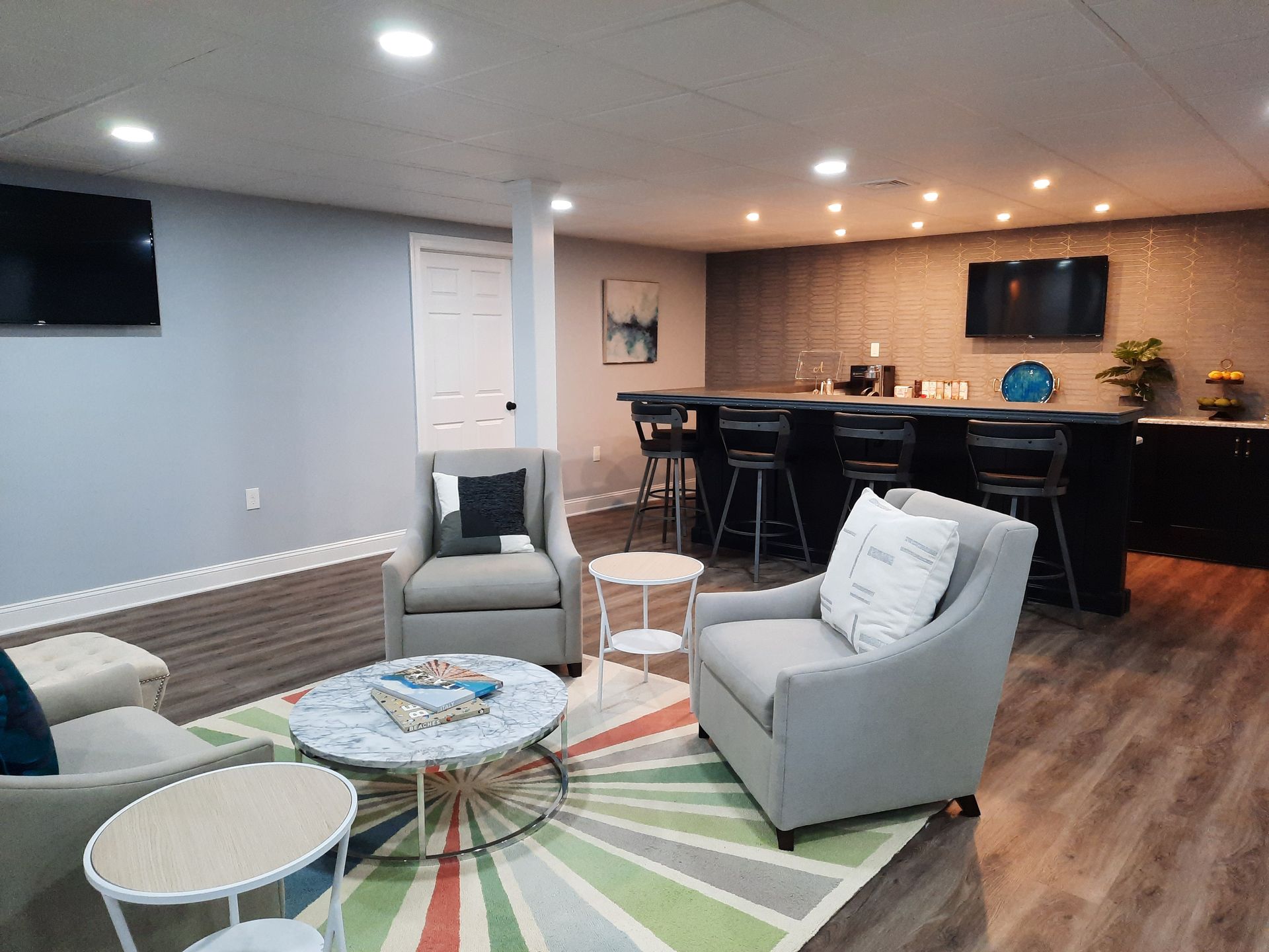 A living room filled with furniture and a television.