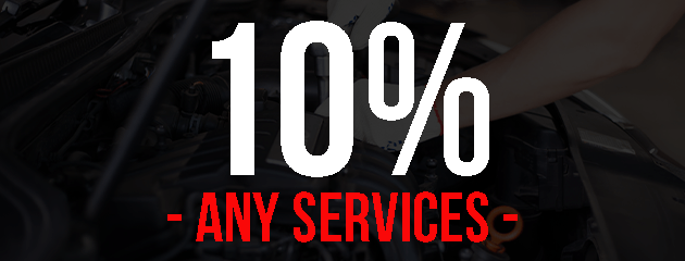 10% off any services. Red text on a car's engine bay.