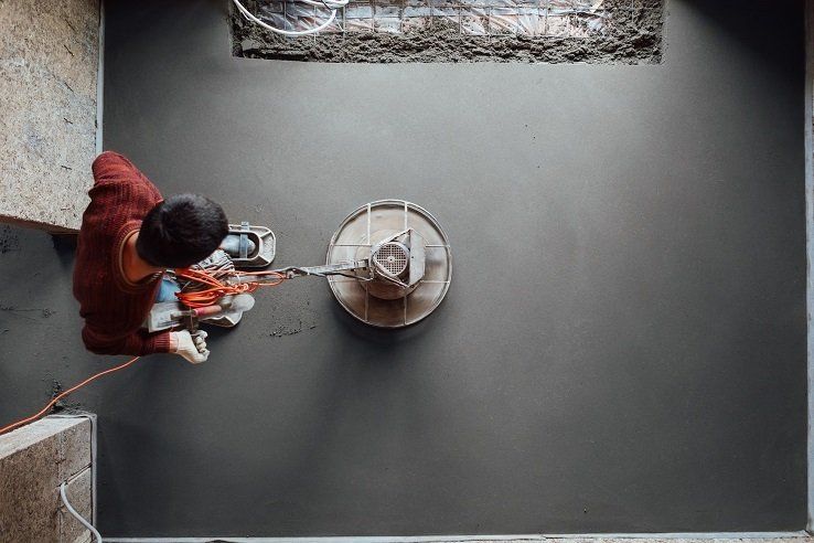 Professional concrete contractor repairing the concrete floor of a residential home in Bendigo, VIC.
