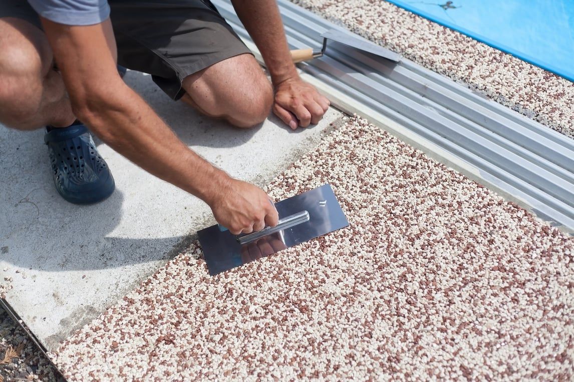 Concrete contractor installing exposed aggregate concrete footpath in Bendigo, Victoria.