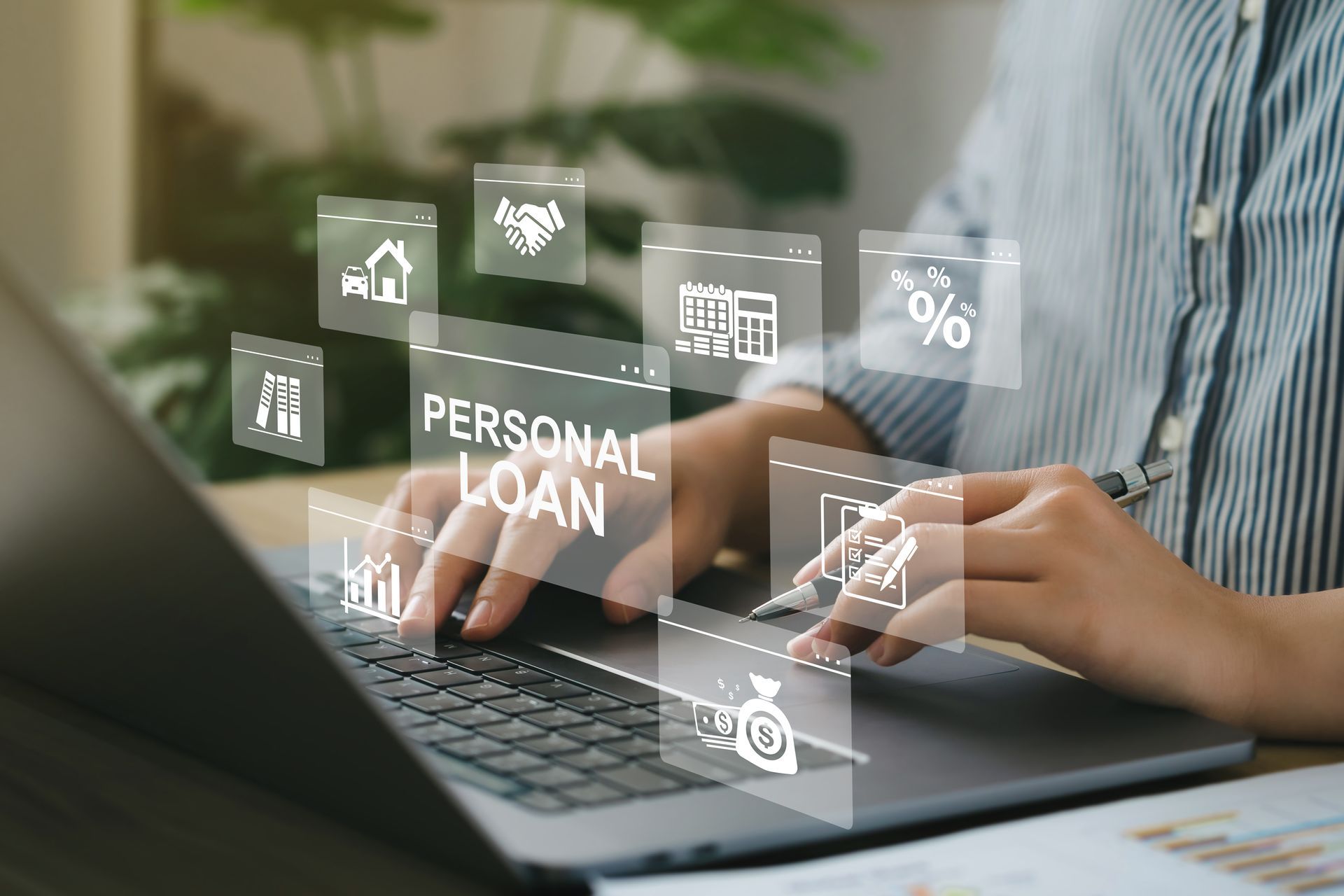 Women use a computer with the personal loan icons on a virtual screen.