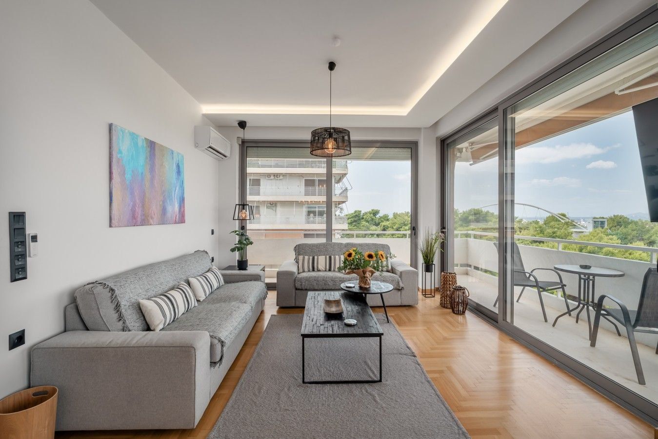 Living room of Faliro Blue, a furnished apartment on the Athens Riviera run by Cheez Hospitality