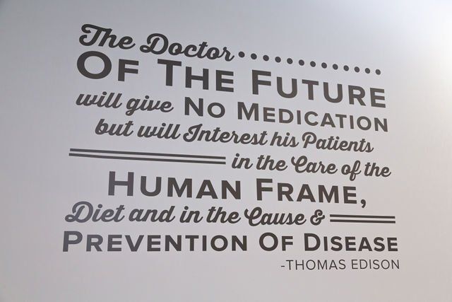 Text quote on a wall: