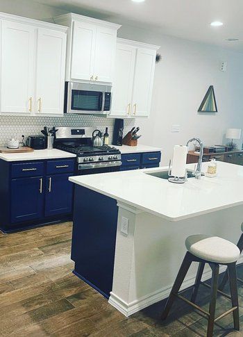 Home in Pflugerville, TX that had cabinet painting completed by Austin Painting and Cabinets
