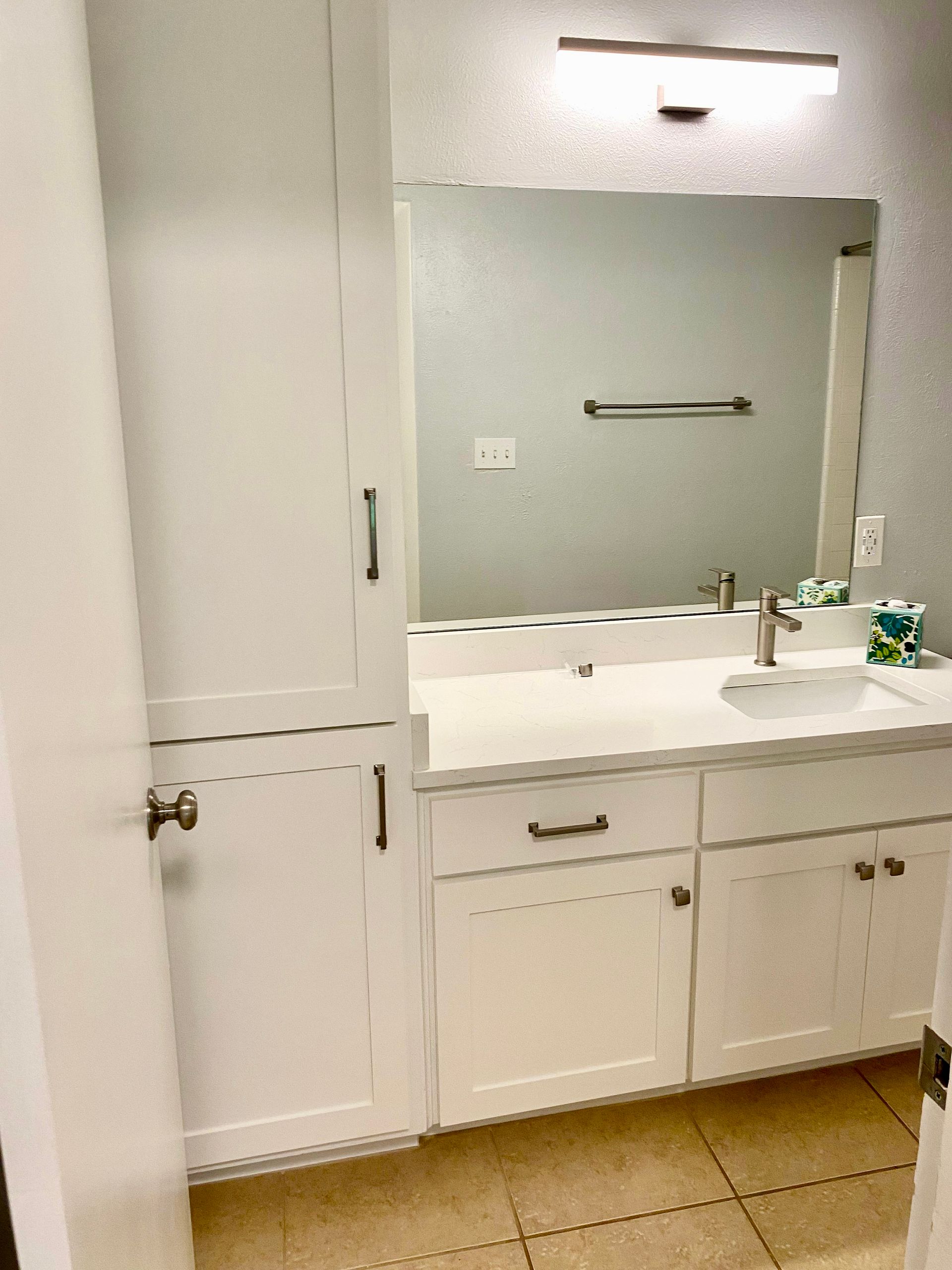 Austin bathroom cabinet refacing with shaker cabinet doors and Benjamin Moore Simply White paint