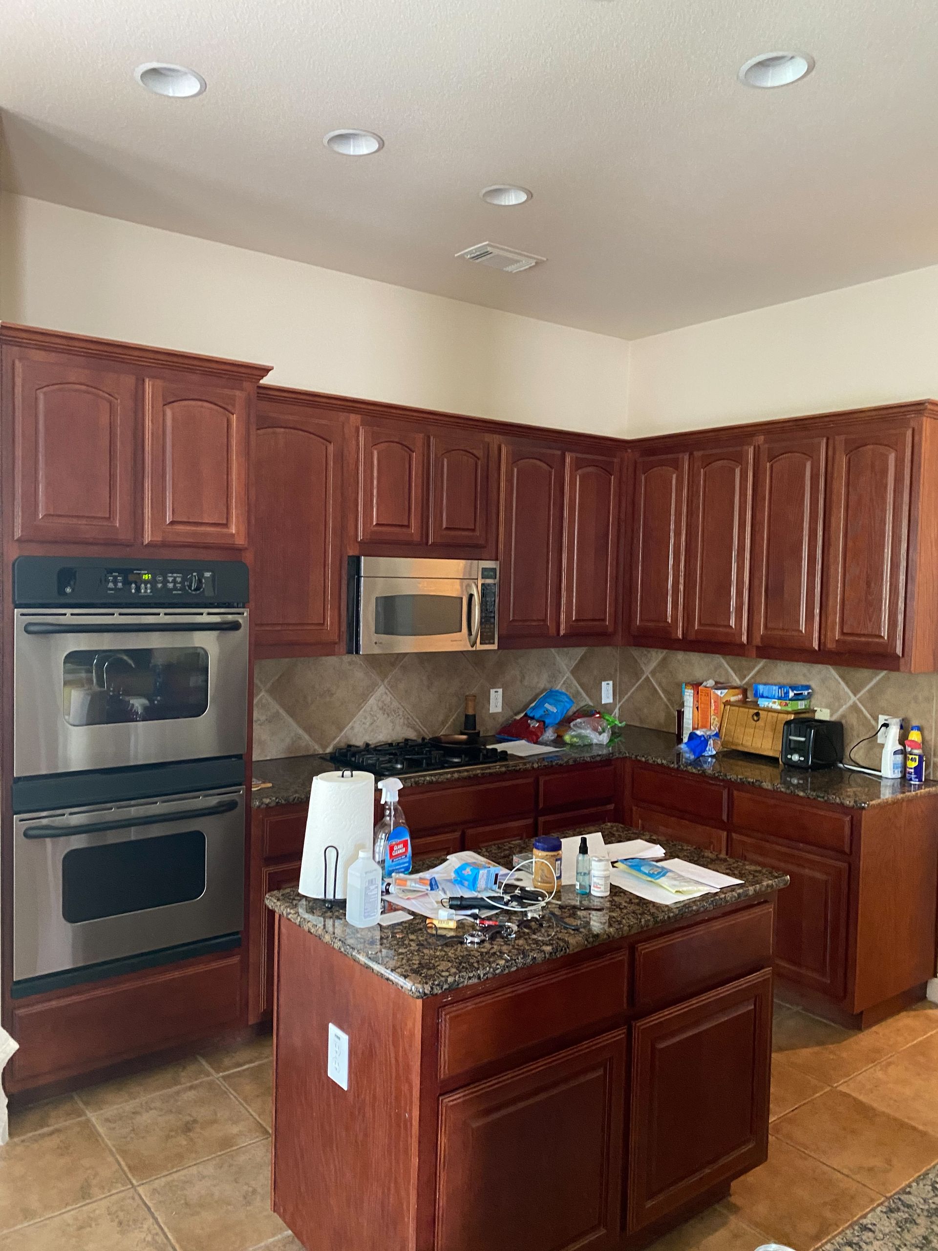 Circle C Ranch Austin kitchen before remodel with dated cabinets and finishes