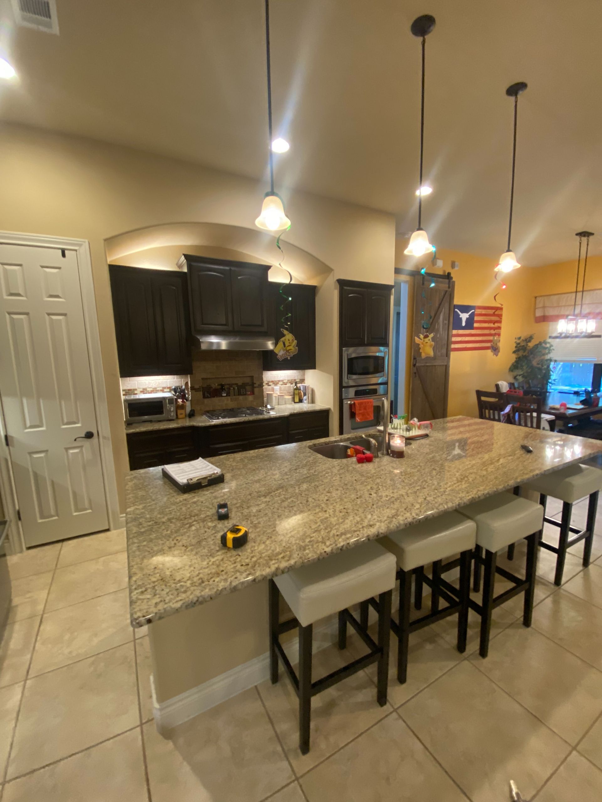 Austin kitchen before remodel in Brushy Creek with outdated cabinets and finishes
