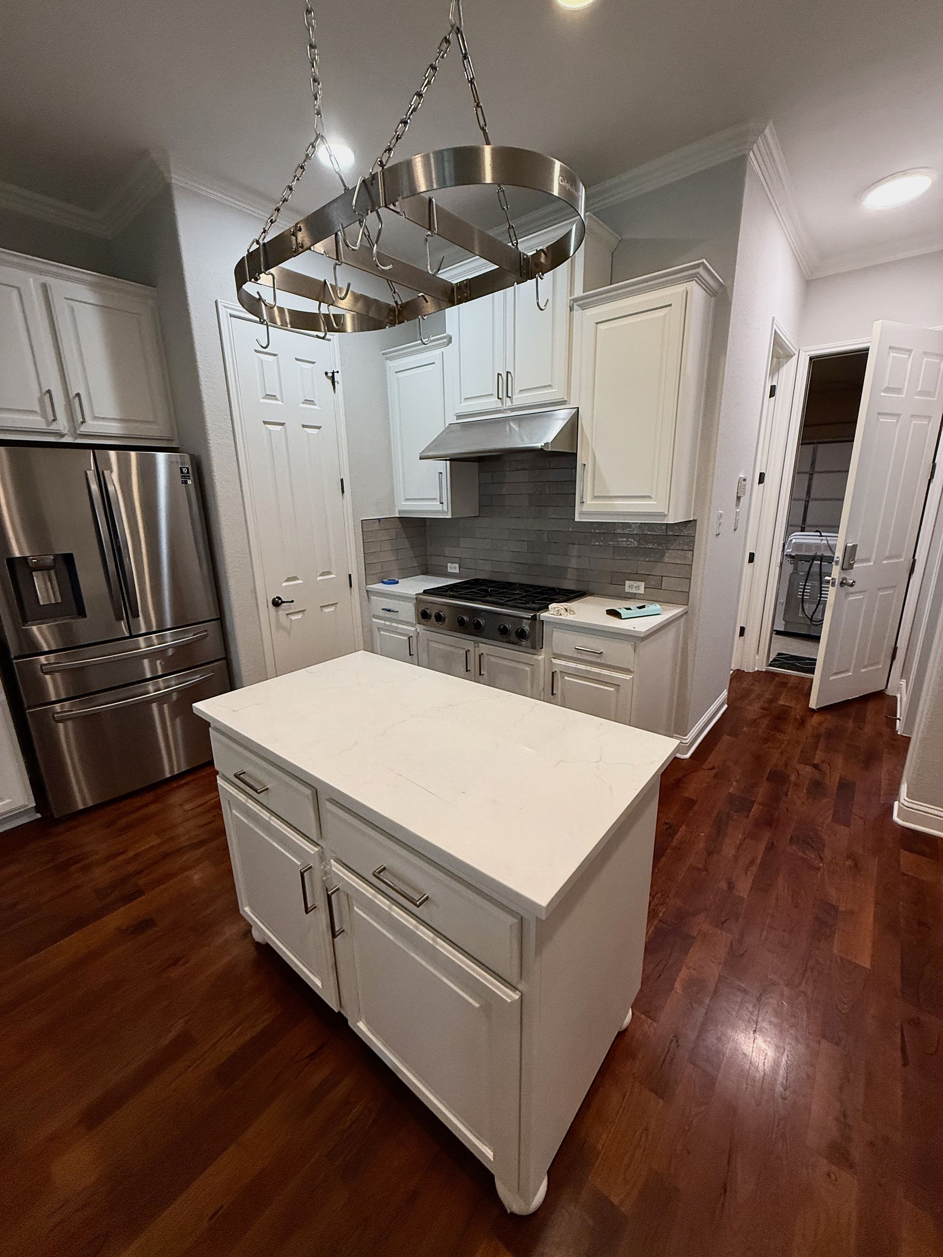 Kitchen remodel in Cedar Park completed before the homeowner returned for interior painting