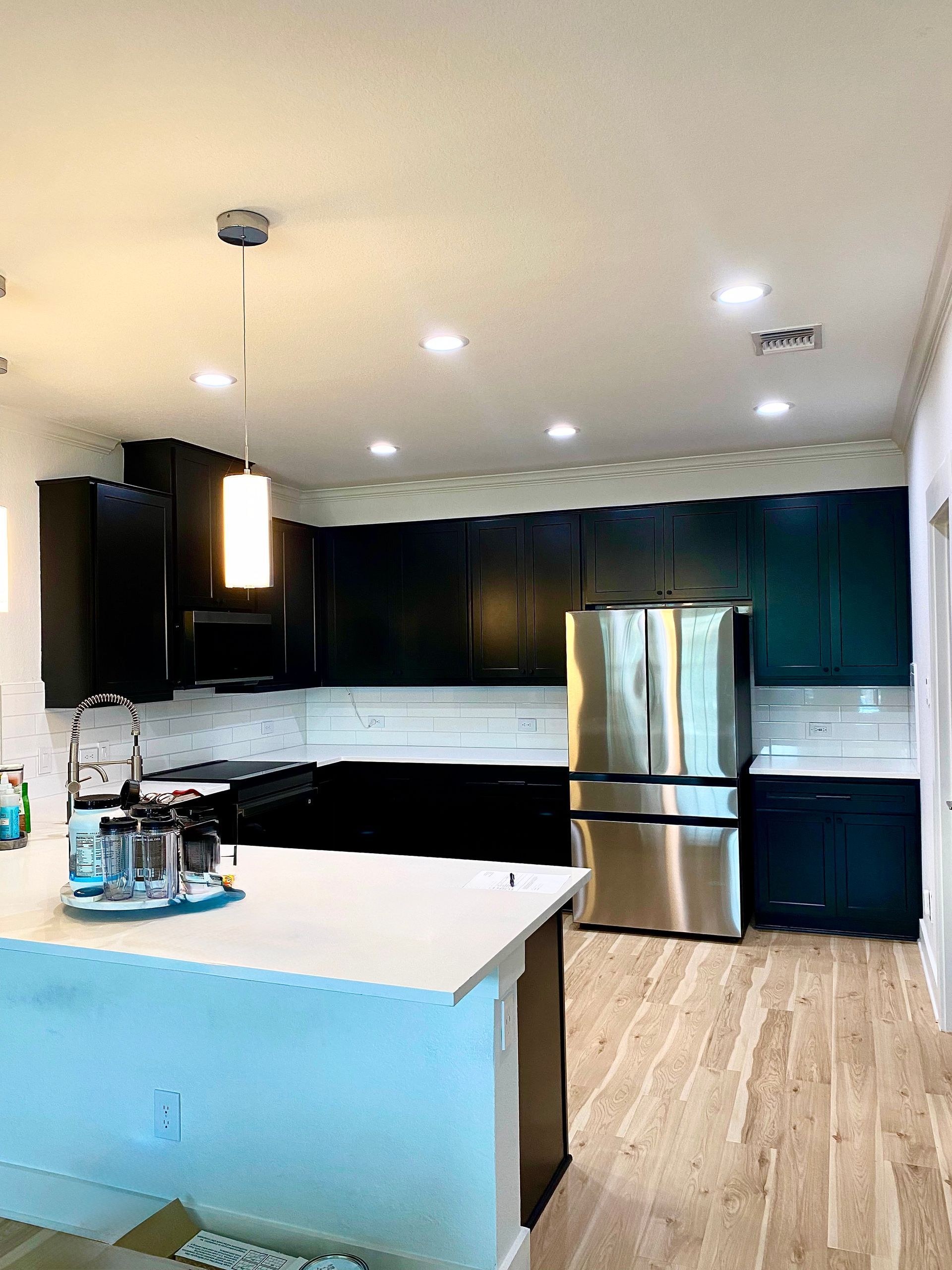 Georgetown kitchen remodel after shaker cabinet refacing painting and tile backsplash