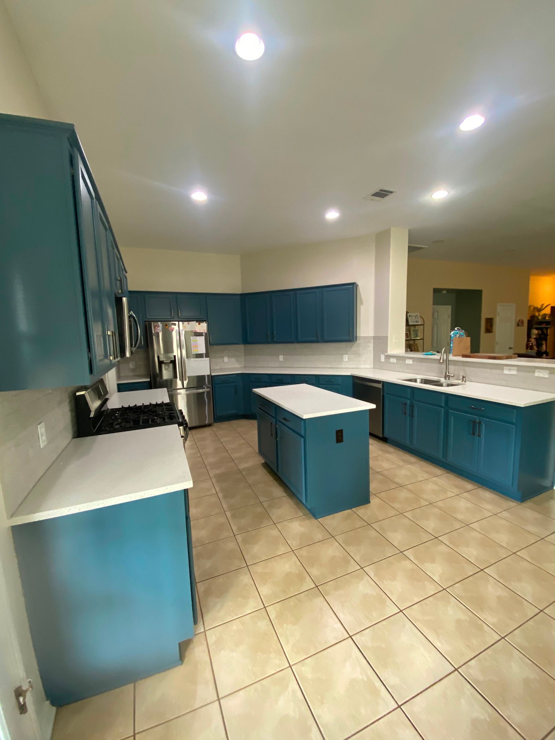 Leander kitchen remodel with Waterloo painted cabinets Mattonella Neve backsplash and Shoji White walls