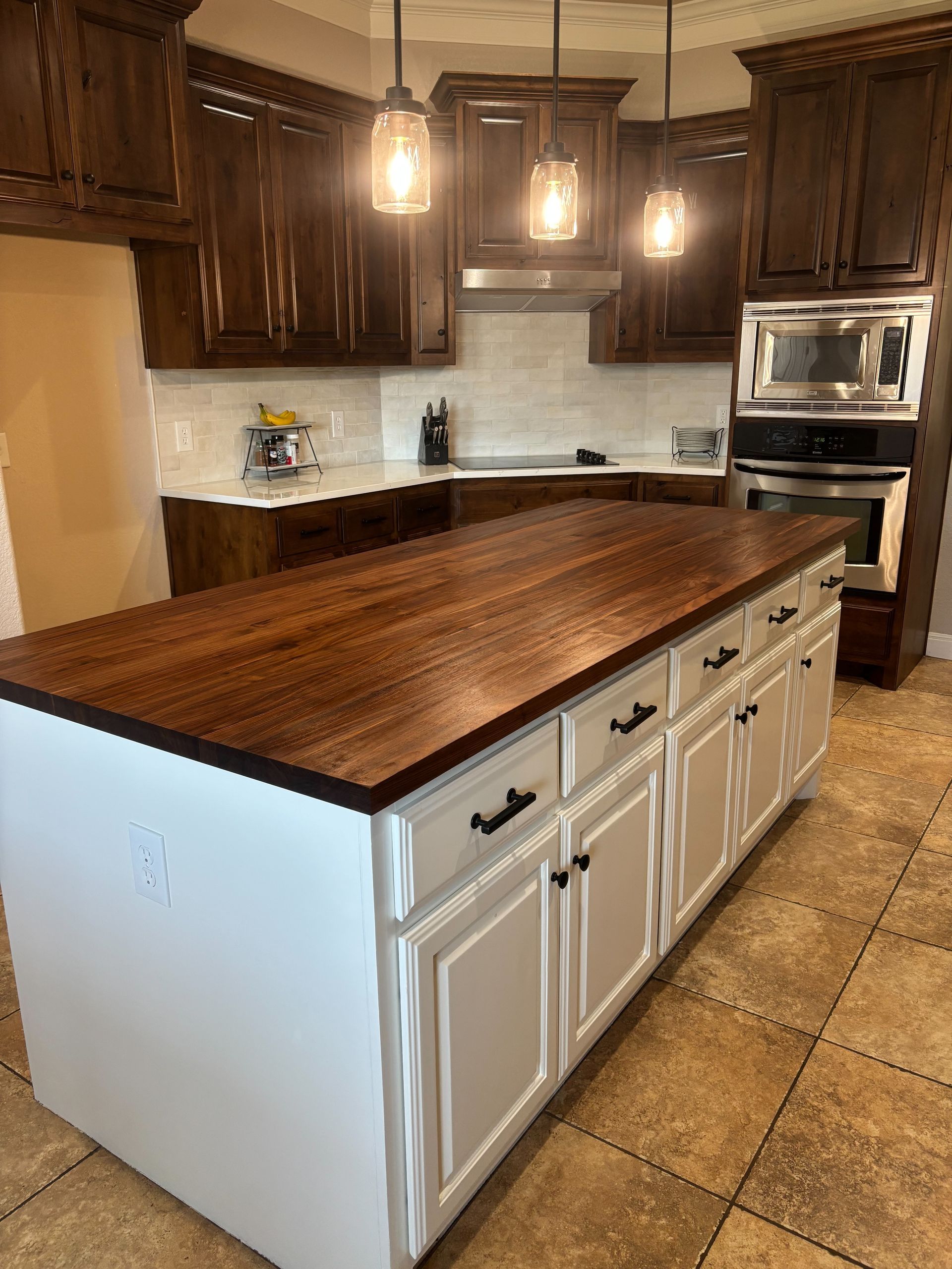 Kitchen remodel in Liberty Hill completed for a repeat client of Austin Painting and Cabinets