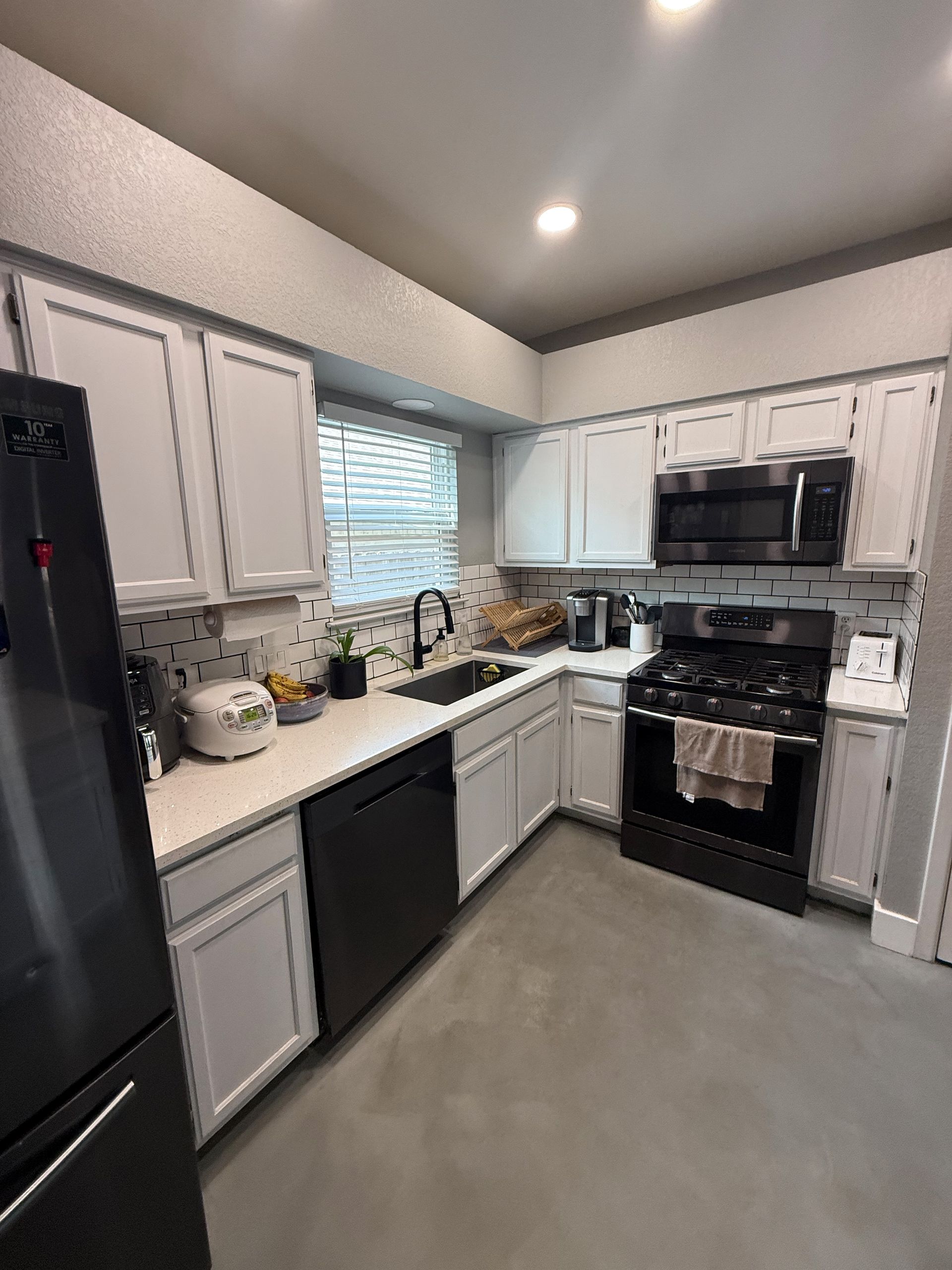 Northwest Austin kitchen before remodel with existing cabinetry prior to furdown removal and slim shaker cabinet installation