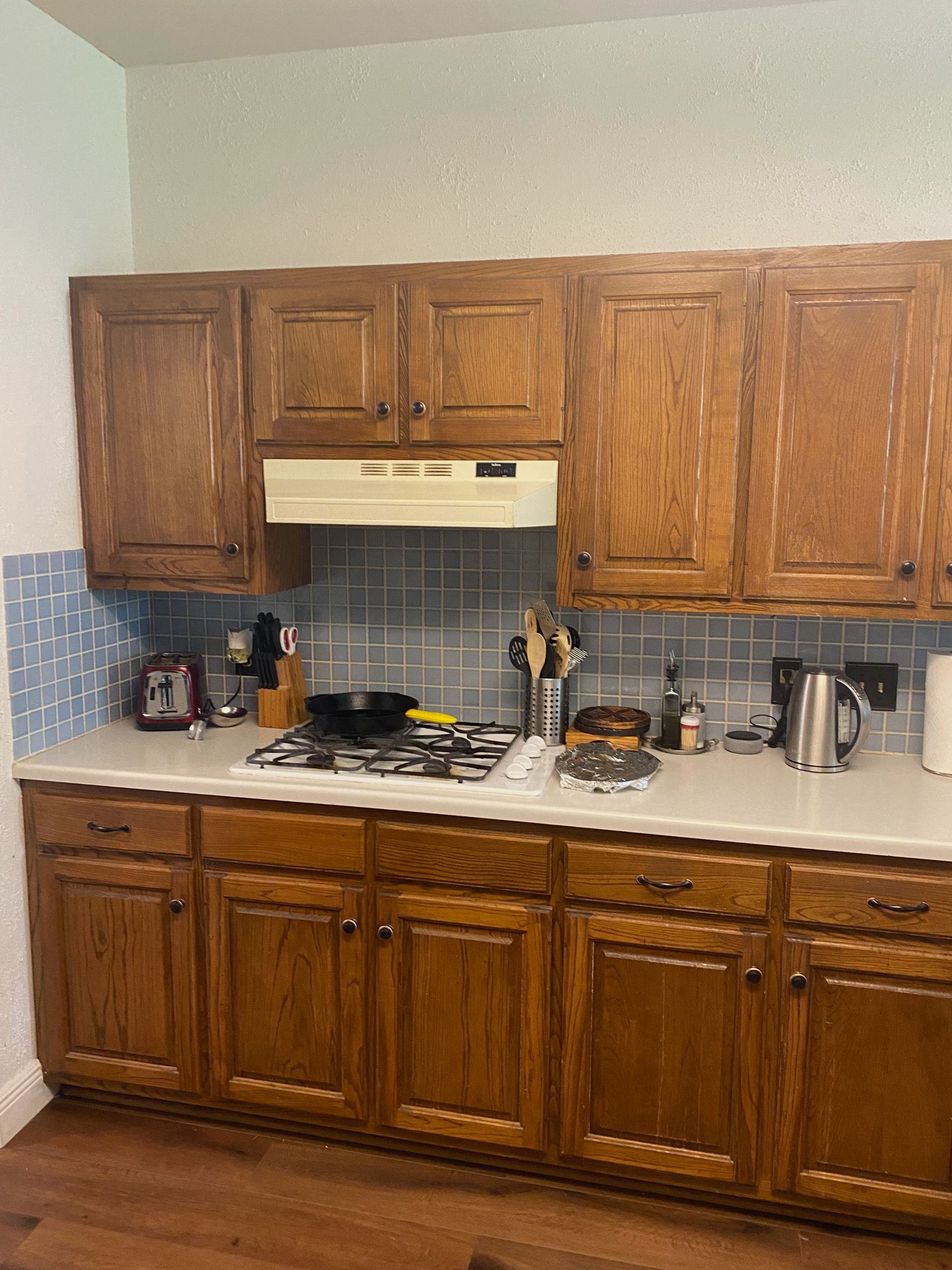Barrington Oaks kitchen before remodel with dated cabinets and countertops