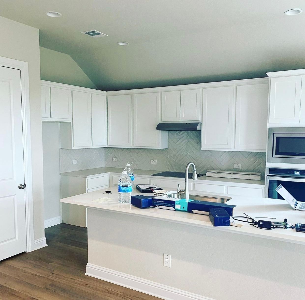 Round Rock cabinet painting before photo with dated kitchen cabinets
