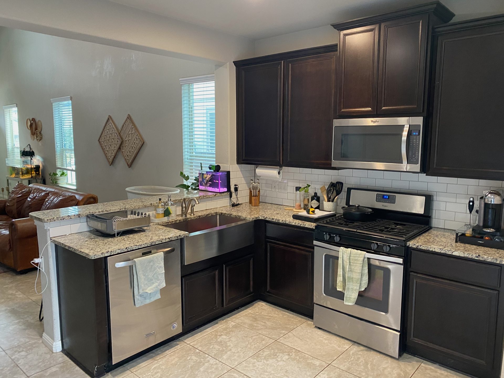South Austin kitchen before remodel with raised bar top and dated cabinets