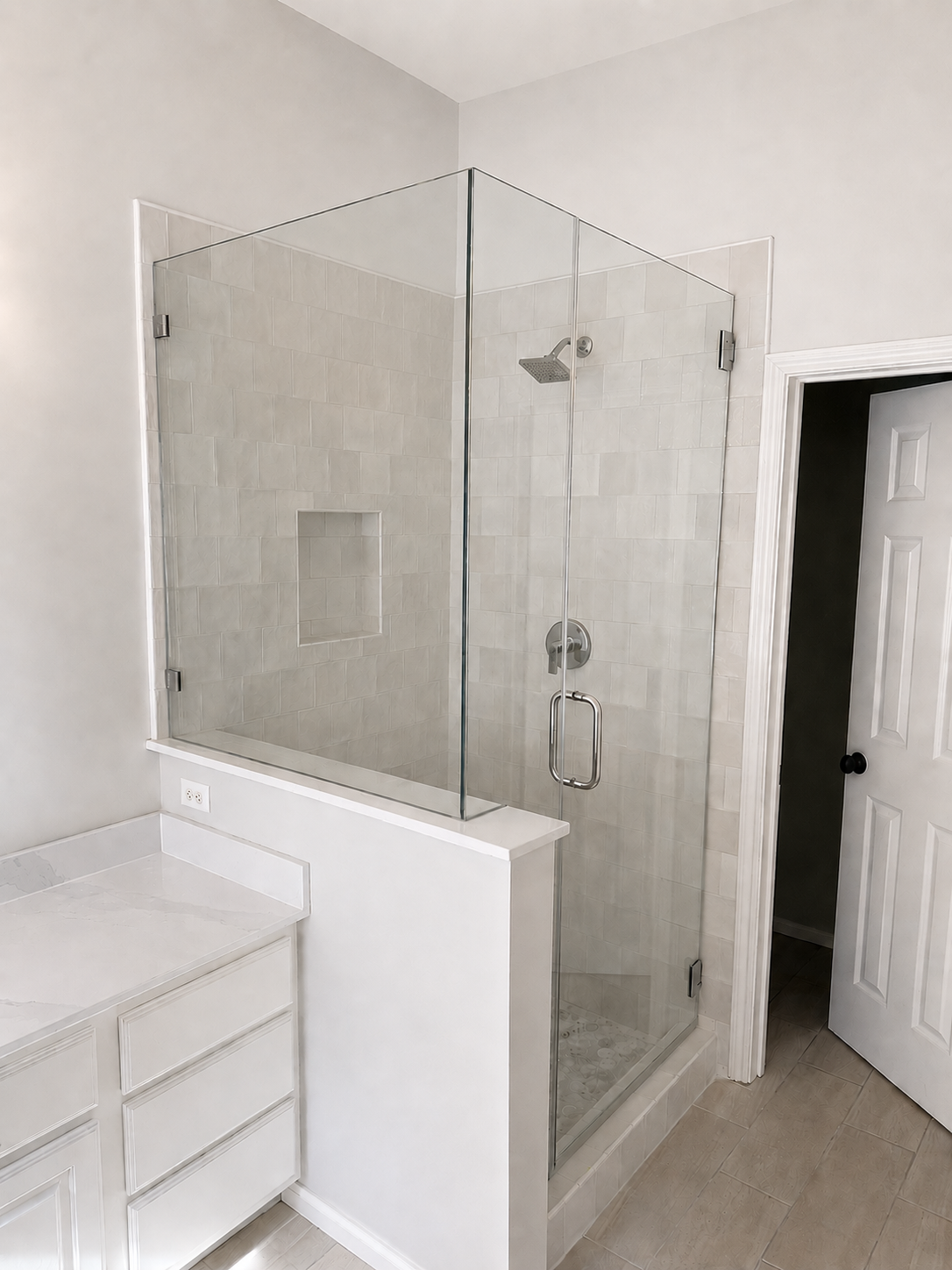 Steiner Ranch bathroom remodel with walk-in shower frameless glass and quartz countertops