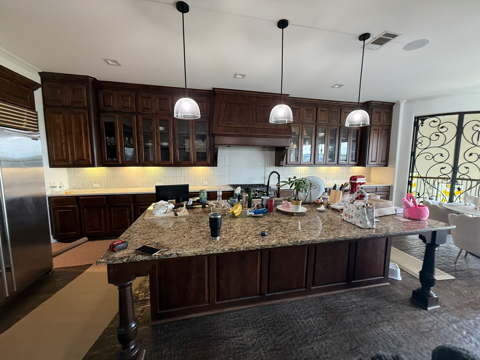 Steiner Ranch kitchen before remodel with knotty alder cabinets