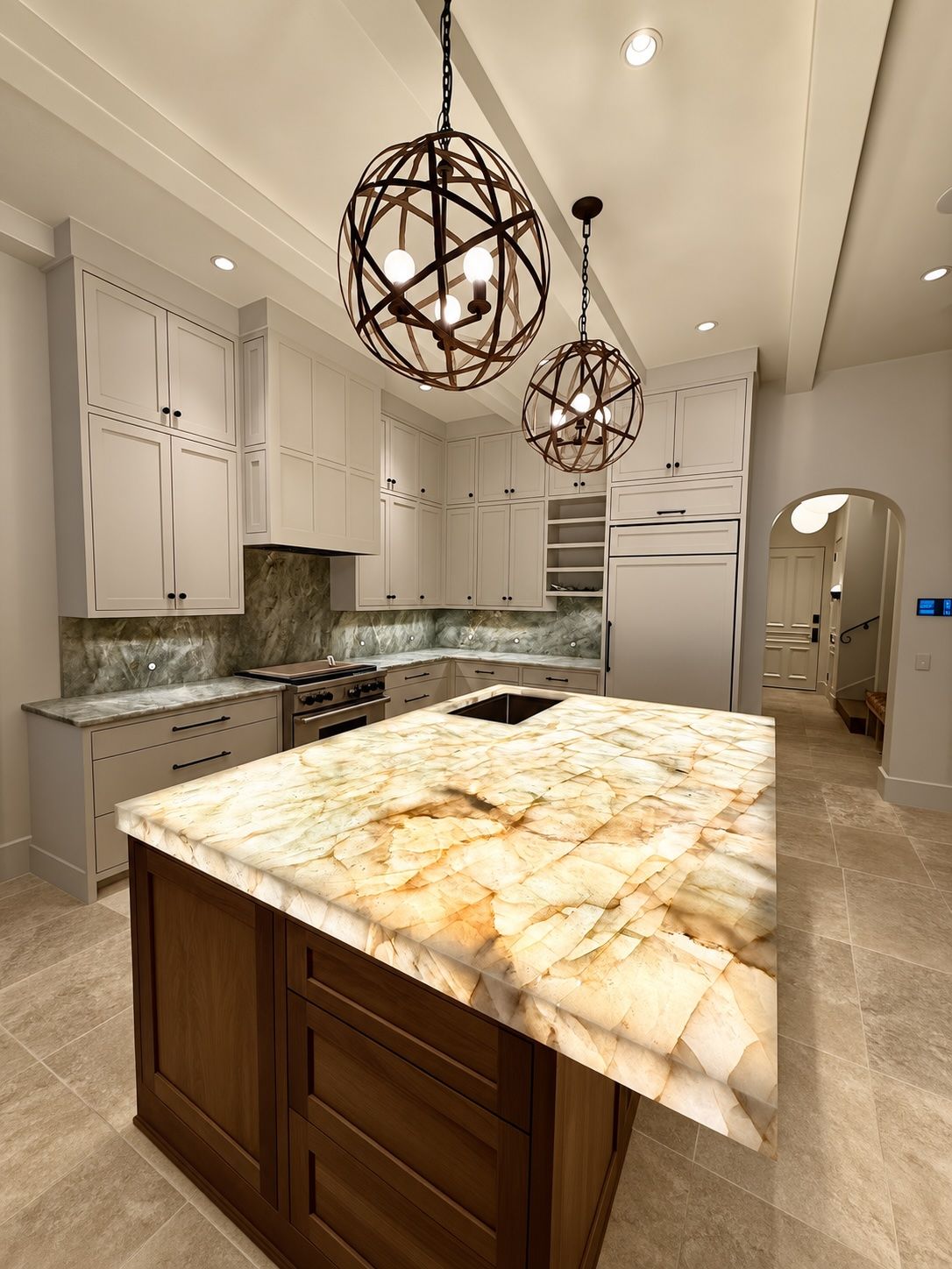 Tarrytown kitchen remodel with LED-lit quartzite island custom walnut shaker cabinets and quartzite backsplash